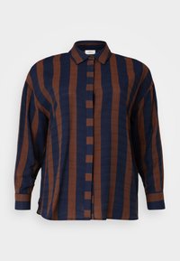 Ilga rankovė marškiniai tamsiai mėlynos ir rudos spalvos dryžiais; turi apykaklę, mygtukų uždarymą ir laisvą kirpimą su tekstūruotu audiniu.