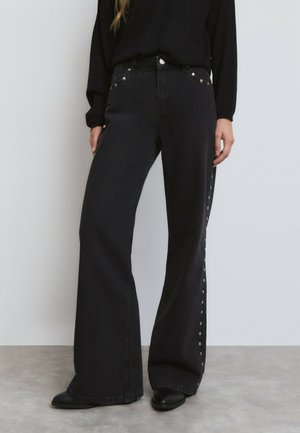 TACHAS ESTRELLAS - Pernera ancha - black