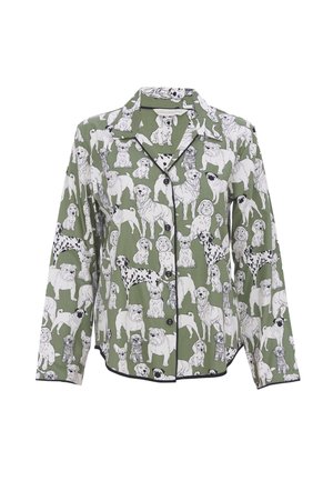 Grünes Schlafanzugshirt mit Hundemuster in Schwarz und Weiß, langen Ärmeln, einem Spitzkragen und schwarzem Piping entlang der Kanten.