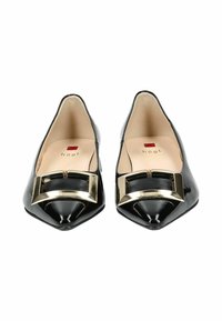 Ballerine in vernice nera con punta affusolata, caratterizzate da un accento metallico dorato sul davanti. All'interno è presente il nome del marchio "hög l."
