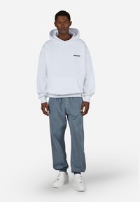 Pegador LOGO JOGGER - Treniņtērpa apakšdaļas - vintage shadow blue