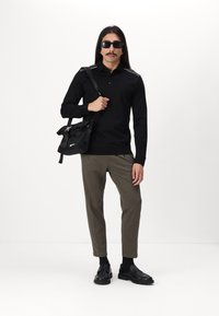 KARL LAGERFELD Polo shirt - black