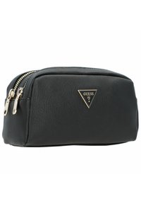 Borsa cosmetica sintetica nera con finitura texturizzata, doppi zipp, e logo triangolare in oro di Guess sul davanti. Design compatto, forma rettangolare.