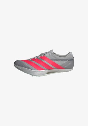Grey athletic shoes with pink stripes, featuring a sleek design, lightweight material, and spiked soles for traction.