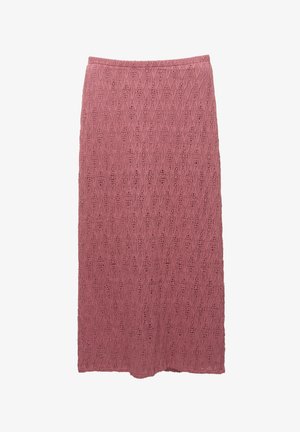 Gebreide lange rok in stofroze, met een diamanten kantpatroon, elastische tailleband en vloeiende val. Zachte textuur met een lichte afwerking.