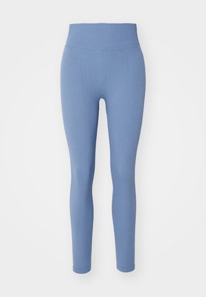 Leggings de tejido acanalado en azul claro con una cinturilla alta, fabricados en un material elástico; presentan una textura suave y un diseño ajustado.