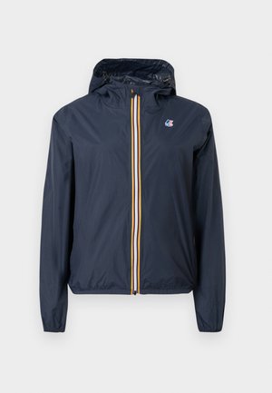 Veste légère à capuche bleu marine avec fermeture éclair rayée multicolore sur le devant et petit logo sur la poitrine gauche, poignets et ourlet élastiques.