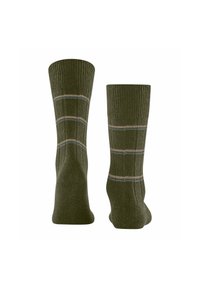 Calze verde scuro con texture a coste, caratterizzate da tre strisce orizzontali grigie chiare e arancioni. Design classico di lunghezza crew.