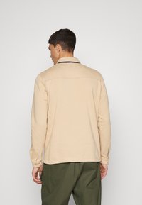Fila YORK - Polo - cuban sand