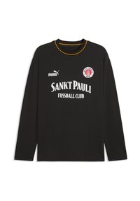 Langærmet sort T-shirt i bomuld med rund halsudskæring, med hvidt "SANKT PAULI FUSSBALL CLUB"-tekst og en rød logo. Gul accentering ved kraven.