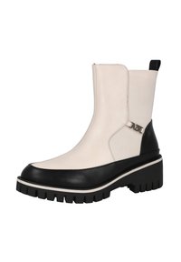 Botas de tobillo chunky con parte superior beige, acentos de cuero negro, suela de goma y cremallera lateral. Presenta un detalle del logo plateado en el lateral.