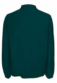 Veste vert foncé à manches longues avec col montant, vue de dos.