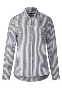 Camicia button-up a righe verticali grigie e bianche con motivi a stelle verdi, dotata di taschino sul petto e maniche lunghe. In tessuto di cotone.