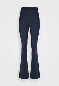 Navy flared broek gemaakt van een rekbare stof. Voorzien van een platte tailleband en verticale naden aan de voorkant voor een gepolijste uitstraling.