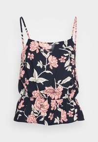 Top floral em azul marinho com alças finas, apresentando padrões de flores rosa e brancas, cintura franzida e uma bainha peplum para um ajuste descontraído.