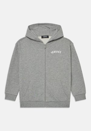 Gray zip-up hoodie made of soft fabric featuring a kangaroo pocket and front logo "VERSACE" in white. Includes a hood and ribbed cuffs.