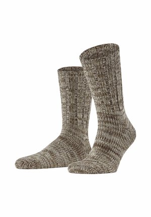 Braune, strukturierte Socken mit einem gerippten Design und einer verstärkten Ferse. Das Material weist eine Mischung aus hellen und dunklen Farbtönen auf.