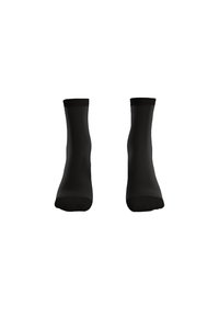 Chaussettes noires en matériau lisse avec un bord renforcé, de hauteur à la cheville, sans motifs ni accents visibles.