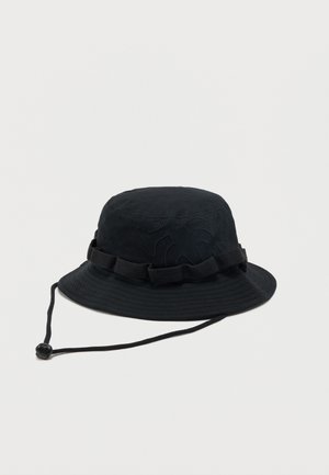 Black bucket hat with a wide brim, adjustable chin strap, and fabric loop detailing around the crown against a plain background.