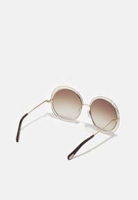 Vald, gold-coloured/brown