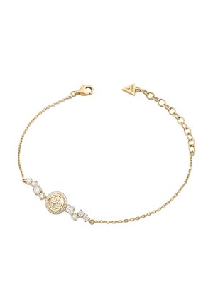 Bracelet délicat en chaîne dorée avec des cristaux scintillants et un pendentif rond orné d'un logo double G entrelacé, sécurisé par un fermoir mousqueton.