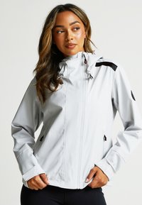 Light gray waterproof jacket with a hood, black accents, zippered pockets, and adjustable cuffs. Smooth texture and tailored fit.