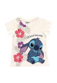 Lasten valkoinen T-paita, jossa on piirretty hahmo Stitch istumassa trooppisten lehtien ja punaisten sekä purppuraisien hibiskuskukkien ympäröimänä, tekstillä "Oudosti söpö".