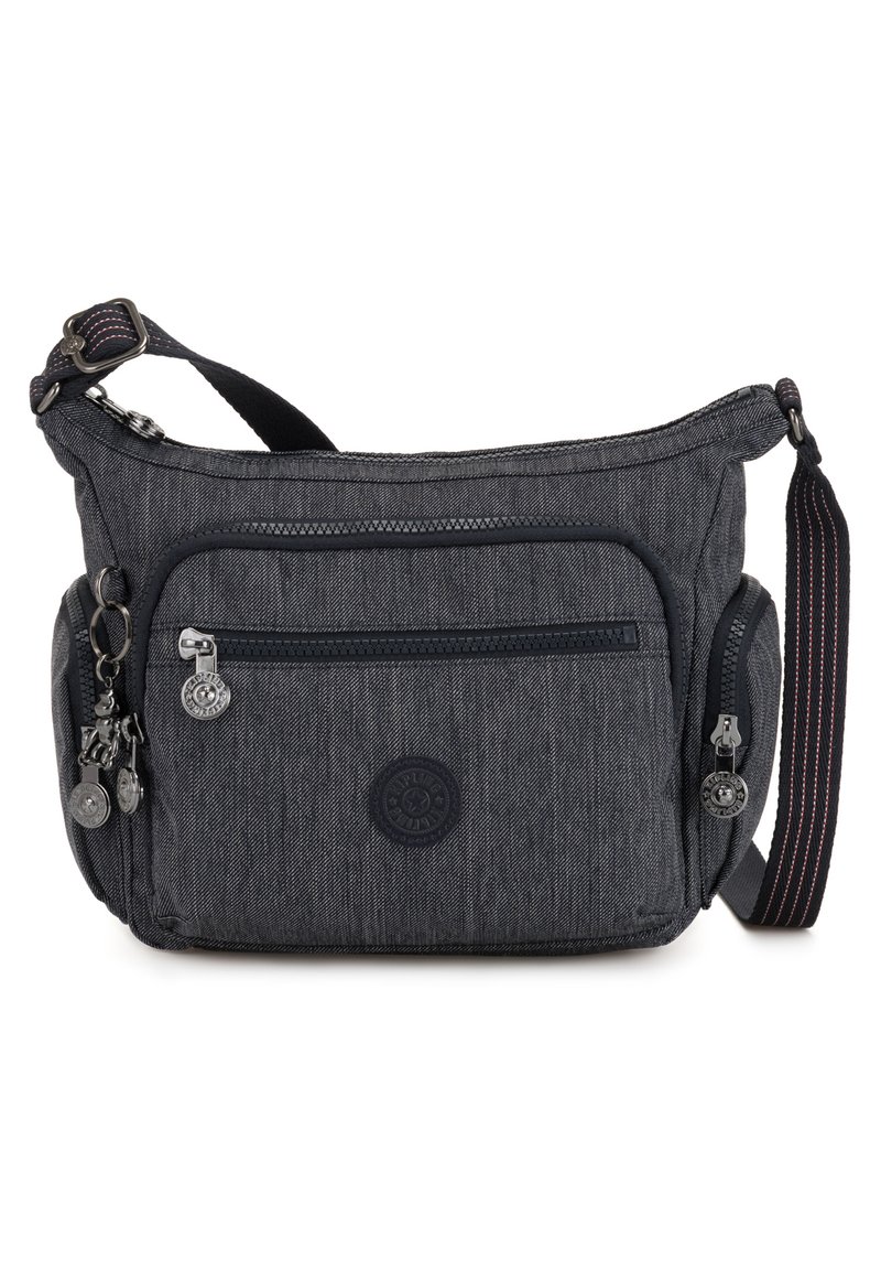 Black textured fabric crossbody bag with a top zipper, front pocket, side pockets, and an adjustable strap featuring red accents.