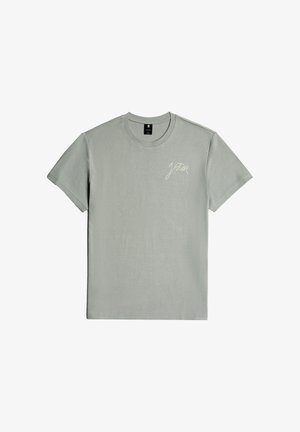 Light gray short-sleeve t-shirt made of cotton; features a crew neck and a small white logo on the left chest area. Smooth texture.