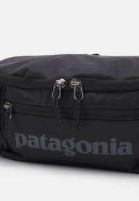 Patagonia HOLE WAIST PACK UNISEX - Jostas soma - black