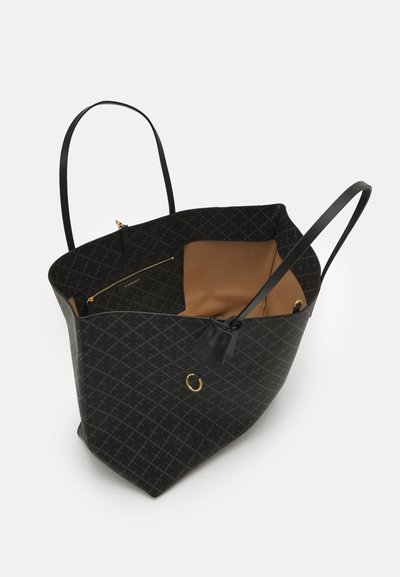 Black tote bag with a textured pattern, two long handles, and a brown interior. Features a zip pocket and gold hardware accents.