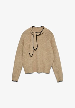 Bež pulover iz pletenine s kratkim krojem, z vrvico za zavezovanje ob vratu ter črnim robom na izrezu in manšetah. Teksturiran, mehak material.