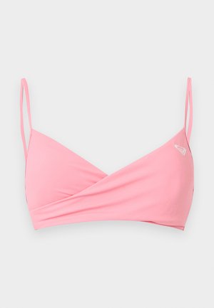 Rosa bikini-topp med tynne doble skulderstropper, omslagsstil foran og en liten hvit logo øverst til høyre.