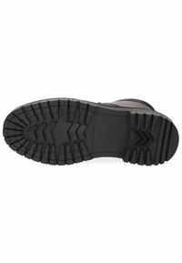 Zwarte rubberen outsole met multidirectionele loopprofielen, voorzien van verhoogde secties voor grip en een glad centraal gebied.