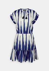Blue and white patterned dress made of lightweight fabric. Features short sleeves, a round neckline, and a ruffled hem with tassel accents.