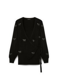 Svart omwraptröja med långa ärmar, prydd med silverfärgade rosettdekorationer. Mjukt tyg och en knytning vid midjan ger en extra detalj.