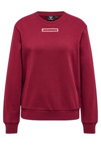 Bordeaux sweatshirt van zachte stof, met een ronde hals en geribbelde manchetten. Toont het "HUMMEL"-logo aan de voorkant.