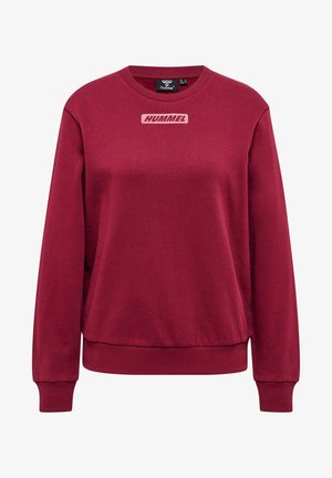 Bordeauxfarbener Sweatshirt aus weichem Stoff, mit Rundhalsausschnitt und gerippten Bündchen. Trägt das "HUMMEL"-Logo auf der Vorderseite.