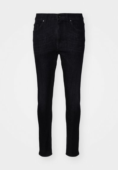 Jeans de ganga preto slim, com uma textura suave, design clássico de cinco bolsos e detalhes de costura discretos. Cintura média com fecho de botão.
