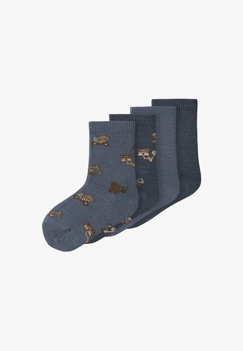 Quattro paia di calzini in cotone blu navy con vari motivi di veicoli da costruzione marroni, dotati di polsini a coste e una texture liscia.