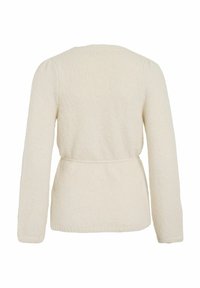 Krēmkrāsas, fakturēts kardigans ar garām piedurknēm, jostu viduklī un apaļu kaklu, ar mīkstu adījumu materiālu.