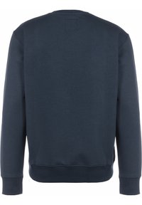 Marineblaues Sweatshirt aus einem weichen Baumwollmix, mit rundem Halsausschnitt, langen Ärmeln und geripptem Saum. Einfarbiger Rücken mit einem kleinen Etikettendetail.