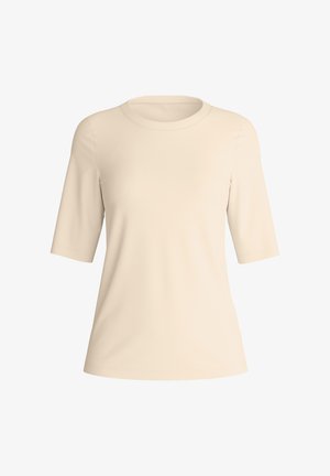 Chemise beige à manches courtes et col rond, avec une texture lisse et une coupe décontractée, présentée sur un fond blanc uni.