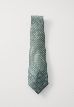 Groene stropdas met een subtiel geometrisch patroon. Gemaakt van een soepele stof met een spitse punt en smalle vorm voor een moderne uitstraling.