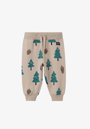 Beige joggingbroek met patronen van dennenbomen en dennenappels in turquoise, elastische tailleband en trekkoorddetail. Zacht katoenen materiaal met geribbelde boorden.