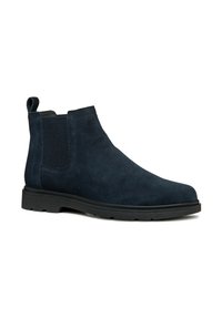 Botas de tobillo Chelsea de ante azul marino con paneles laterales texturizados, suelas de goma planas y una tira en el talón para facilitar el calzado.