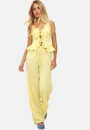 STAY WARM AND COZY - Pantalones - solid   yellow light