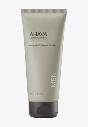 AHAVA Herren-Rasierschaum ohne Schaum, Tube 200 ml, beschriftet mit "Time to Energize" mit Mineralien aus dem Toten Meer, beige mit dunklem Deckel.