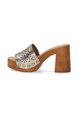Chunky high-heeled slide sandal with a perforated metallic upper, gold-toned studs, and a natural wood block heel.