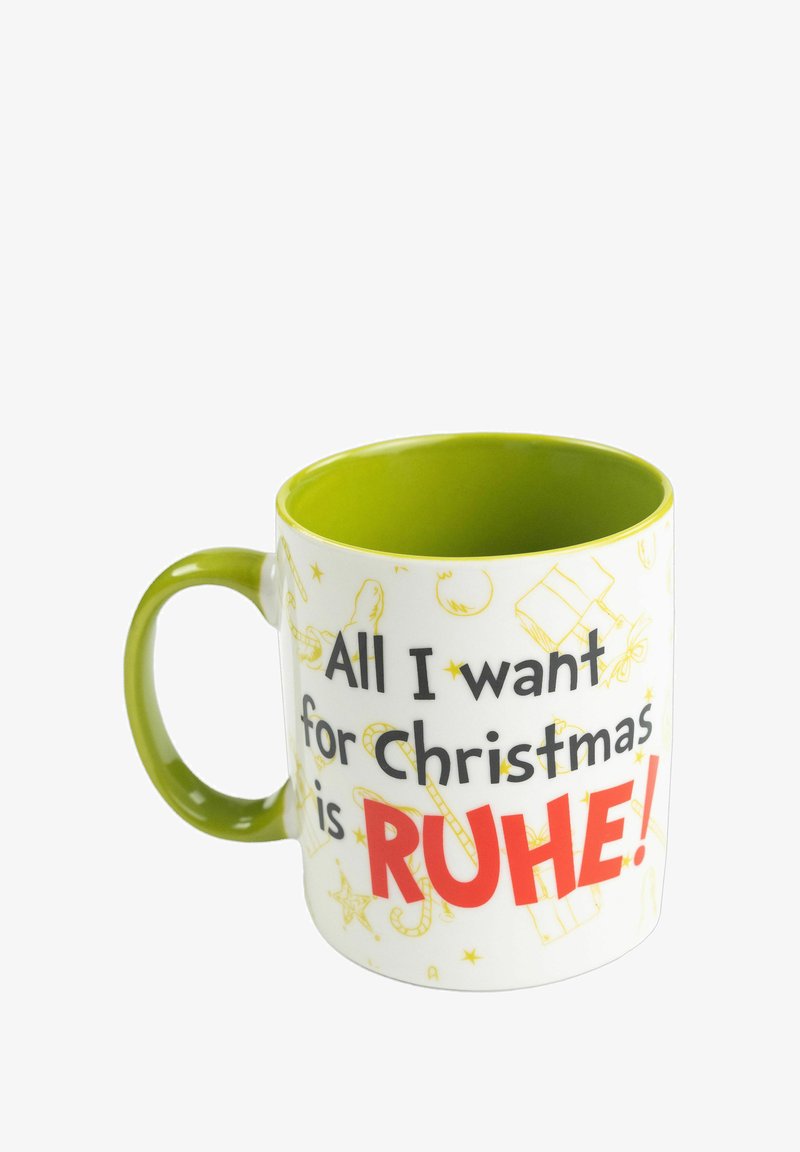 Mug in ceramica con manico e interno verde. L'esterno bianco presenta una stampa con il testo "Tutto ciò che voglio per Natale è RUHE!" in nero e rosso.